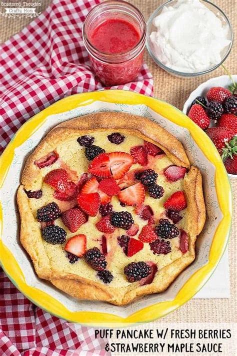 puff-pancake-with-fresh-berries-strawberry-maple-sauce image