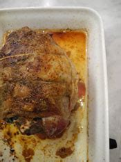 roast-leg-of-lamb-stuffed-with-spinach-and-feta image