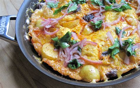 potato-and-chorizo-omelette-jamie-oliver-a-glug-of-oil image