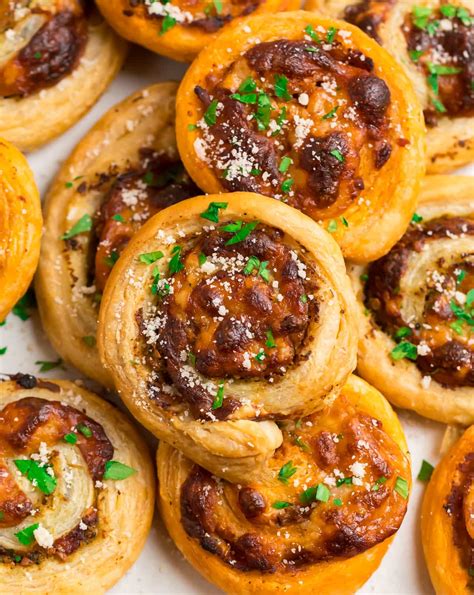 pesto-pinwheels-easy-puff-pastry-appetizer-well-plated-by-erin image