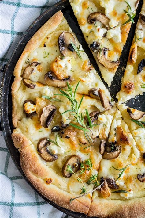 mushroom-pizza-bianco-with-truffle-oil-fresh-herbs image