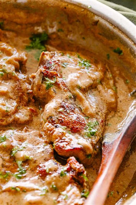 smothered-pork-chops-recipe-diethood image