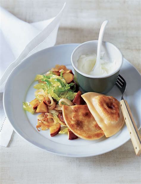 potato-pierogi-with-sauted-cabbage-and-apples image
