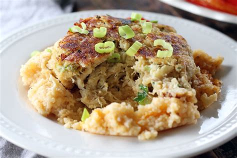 baked-cheddar-cheese-grits-recipe-with-crab-cakes image