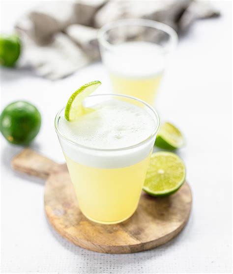 fresh-lime-tequila-sour-familystyle-food image
