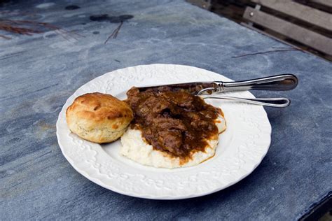pork-grillades-and-grits-dining-and-cooking image