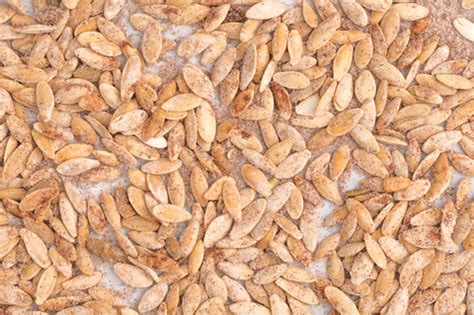 baked-cinnamon-sugar-pumpkin-seeds image