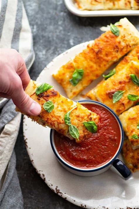 cheesy-pizza-focaccia-breadsticks-whole-and-heavenly image