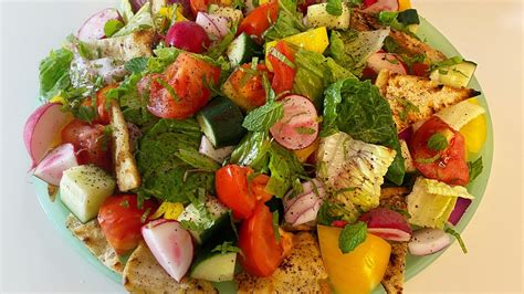 fattoush-salad-with-pita-bread-tomatoes-bell-peppers image