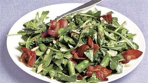 wilted-arugula-salad-with-asparagus-bacon-almonds image