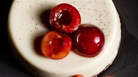 pink-peppercorn-panna-cotta-with-macerated-cherries image