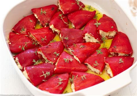 spanish-tapas-piquillo-peppers-stuffed-with-goat-cheese image