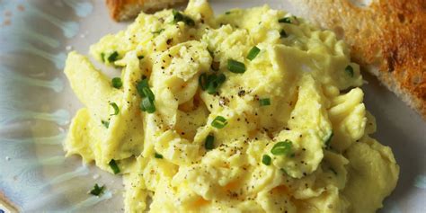 how-to-make-creamy-scrambled-eggs-delish image