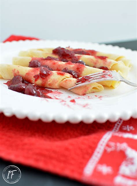 eggnog-crepes-with-cranberry-grand-marnier-compote image