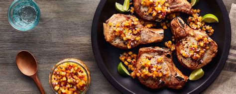 grilled-ranch-pork-chops-with-peach-jalapeo-salsa image