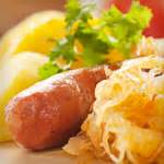 bratwurst-with-onions-and-sauerkraut-recipe-atkins image