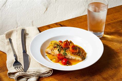 striped-bass-livornese-eatingwell image