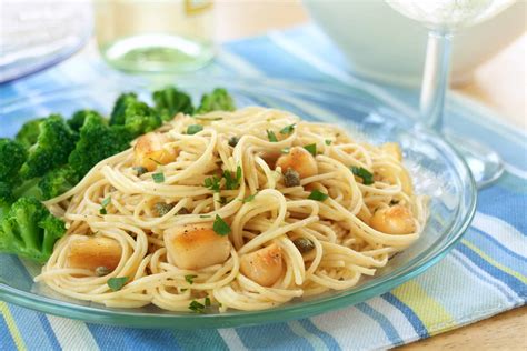 scallop-piccata-on-angel-hair-guiding-stars image