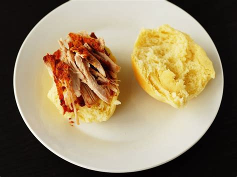 pulled-pork-sandwiches-on-homemade-rolls-a-ducks image