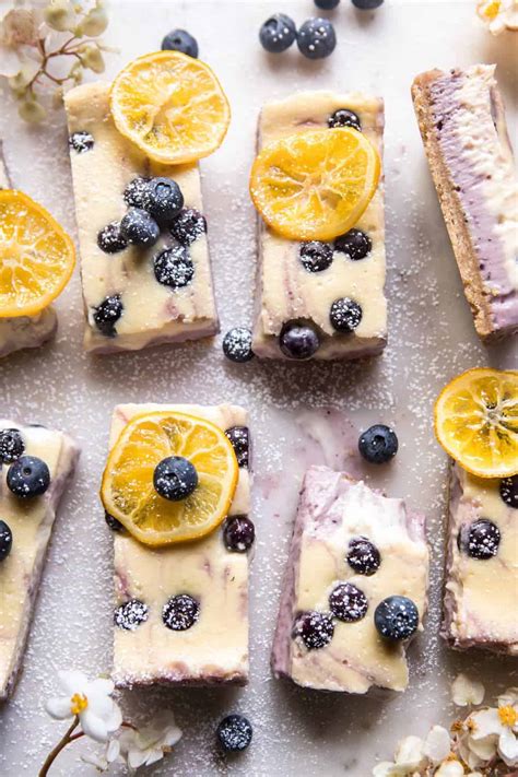 blueberry-lemon-cheesecake-bars-with-candied-lemon image
