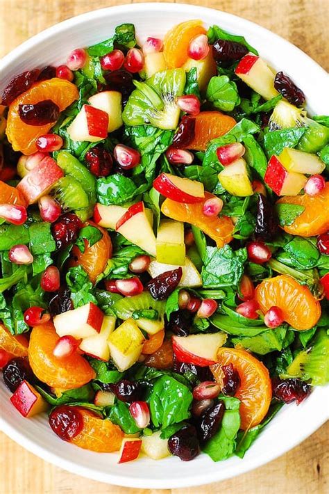 spinach-and-fruit-salad-with-maple-lime-dressing image