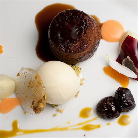 sticky-toffee-pudding-with-blood-orange-sauce image
