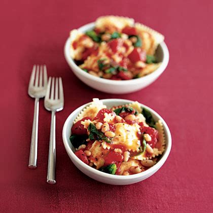 ravioli-with-tomatoes-white-beans-escarole image