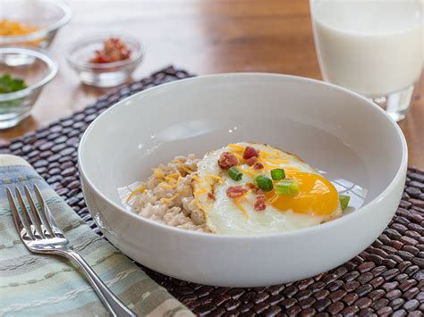 savory-oatmeal-with-soft-cooked-egg-and-bacon image