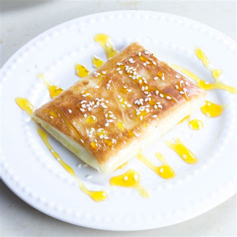 phyllo-wrapped-feta-cheese-with-honey-and-sesame image