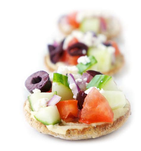 mini-greek-pita-pizzas-haute-healthy-living image
