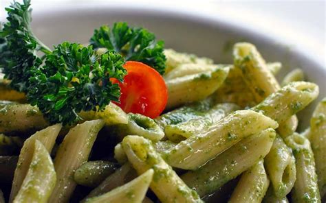 pesto-pasta-with-feta-and-tomato-recipe-easy image