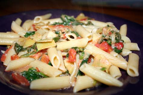 spinach-and-artichoke-penne-pasta-tasty-kitchen-a image
