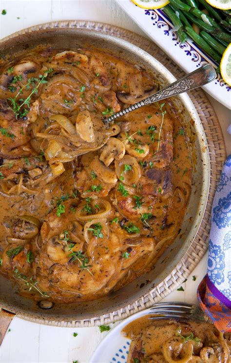 smothered-pork-chops-with-onions-and-mushrooms image