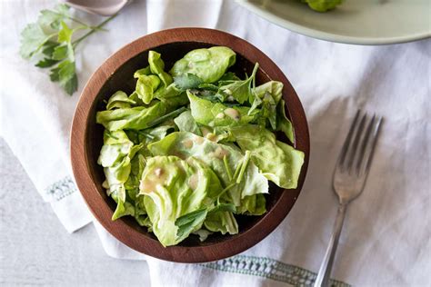green-salad-with-fresh-herbs-and-red-wine image