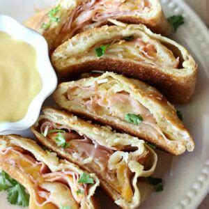 easy-ham-and-cheese-stromboli-belle-of-the-kitchen image