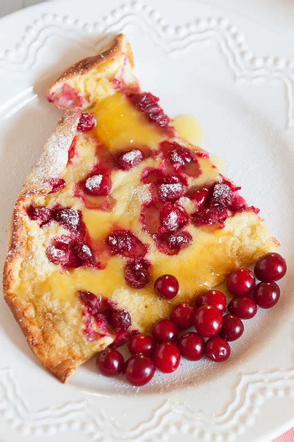 cranberry-dutch-baby-pancake-with-orange-syrup image