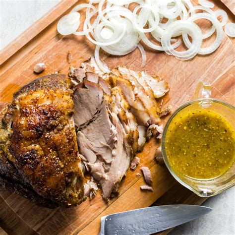 cuban-roast-pork-with-mojo-americas-test-kitchen image