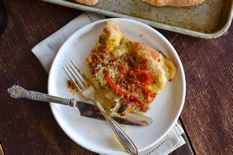 rosemary-focaccia-with-sauted-onions-peppers image