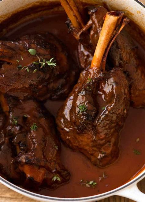 slow-cooked-lamb-shanks-in-red-wine-sauce-recipetin image