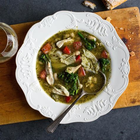 pesto-chicken-cannellini-bean-soup-eatingwell image
