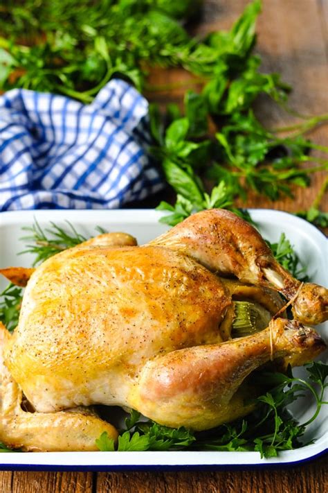 crisp-and-juicy-dutch-oven-chicken-the-seasoned image