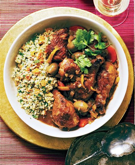 olive-chicken-tagine-with-dried-fruit-couscous image