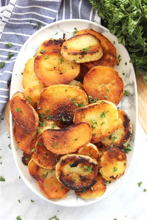 crispy-fried-potato-slices-bite-on-the-side image