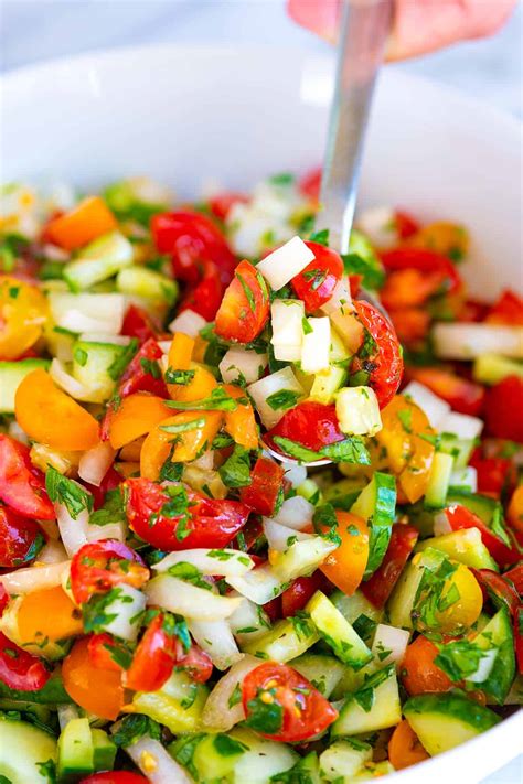 chopped-tomato-onion-and-cucumber-salad-inspired image