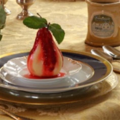 poached-pears-with-raspberry-coulis-think-tasty image