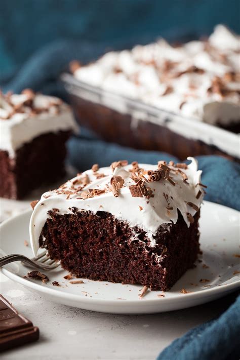 chocolate-cake-with-marshmallow-frosting-cooking image