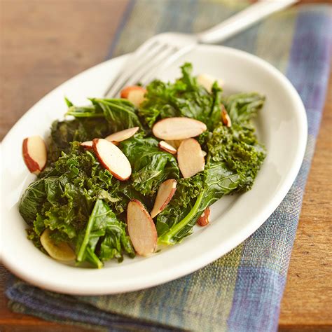 garlicky-wilted-greens-recipe-eatingwell image