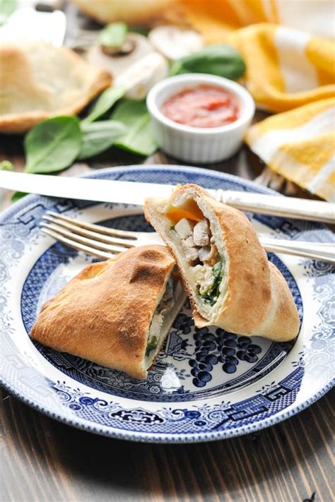 chicken-spinach-and-feta-calzones image