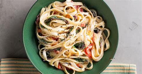 creamy-vegan-pasta-with-swiss-chard-and-tomatoes image