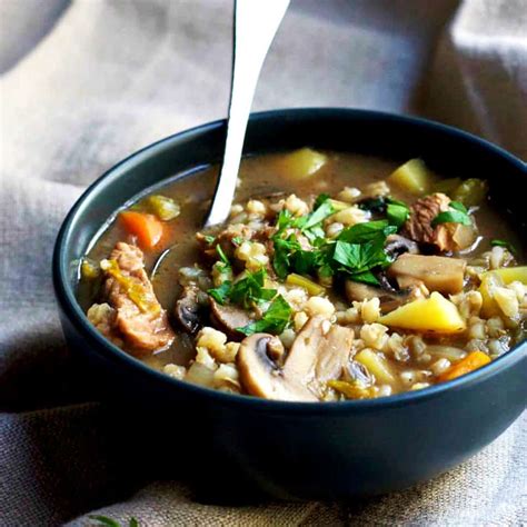 slow-cooker-vegetable-beef-barley-soup-pinch-and-swirl image
